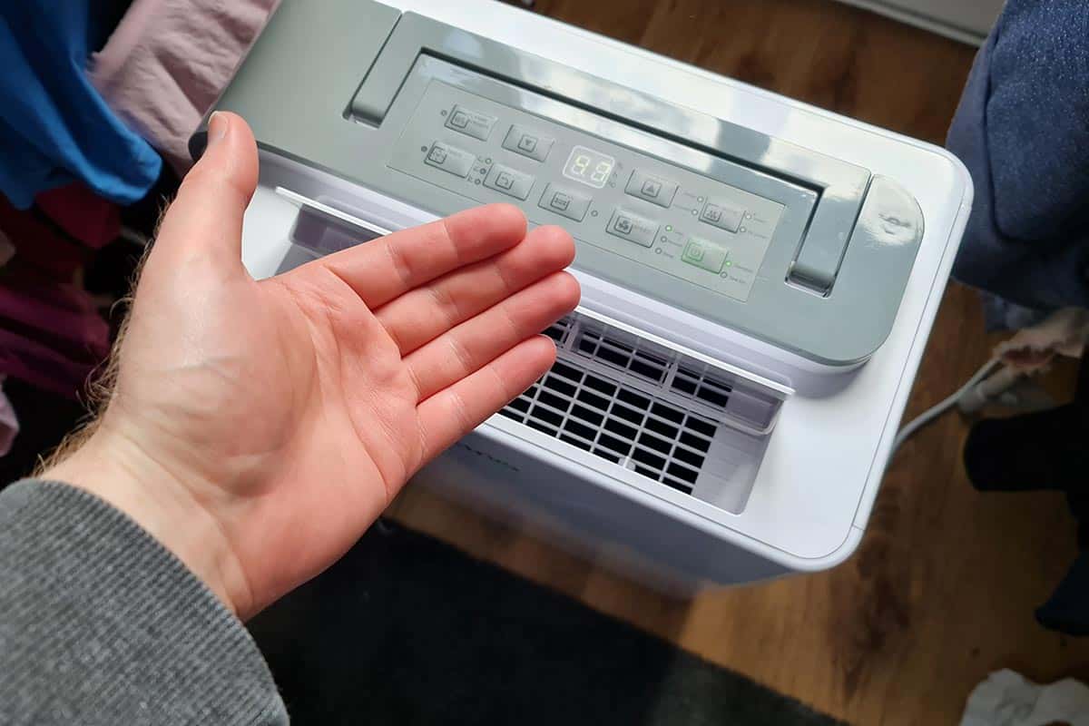 Does A Dehumidifier Blow Hot Air (Or Cold)? – The Humidistat